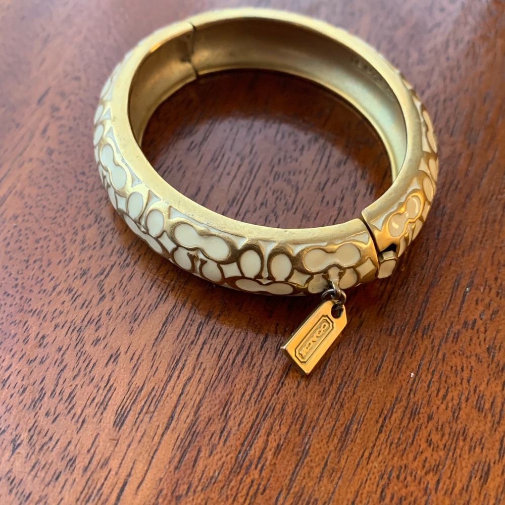 White and gold coach bangle bracelet